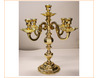 Candelabro de bronce pulido para cinco velas