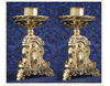 Candelero de mesa en bronce con imágenes grabadas