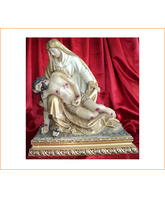 La Piedad - La Virgen María sostiene a su hijo malherido