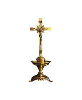 Candelero de mesa con motivos litúrgicos en la base con Cruz