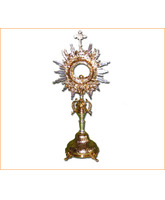 Custodia de metal dorado y plateado cincelado a mano