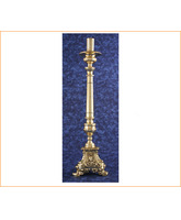 Candelero de bronce con la cara de Jesús en la base
