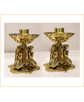 Candelero de mesa en bronce con ángeles arrodillados
