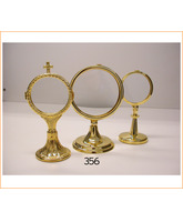 Ostensorio dorado liso de metal con base circular
