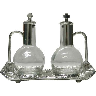 Vinajeras de cristal y metal plateado