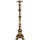 Candelero de bronce con base con tres apoyos