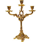 Candelabro de bronce para tres velas