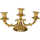 Candelabro dorado para tres velas