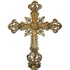 Cruz en bronce con INRI y elementos litúrgicos