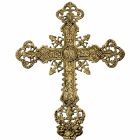 Cruz en bronce con INRI y elementos litúrgicos