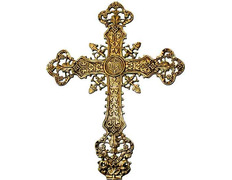 Cruz en bronce con INRI y elementos litúrgicos
