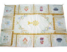 Palio bordado con ribetes y flecos