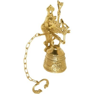 Campana de monasterio fabricada en metal dorado