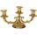 Candelabro dorado para tres velas