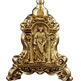 Candelero de bronce con pie cincelado